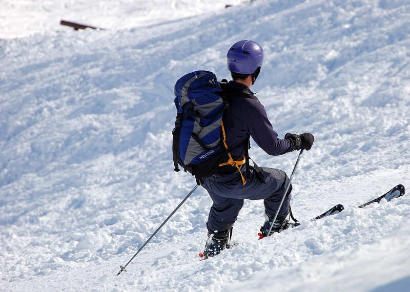 Image of skier on powdery slope