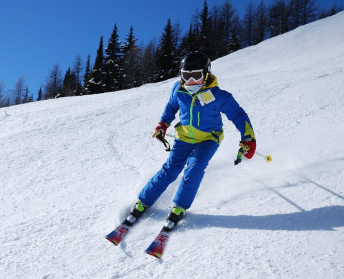 Image of person skiing with parallel skis