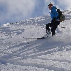 Image of skier on powder snow