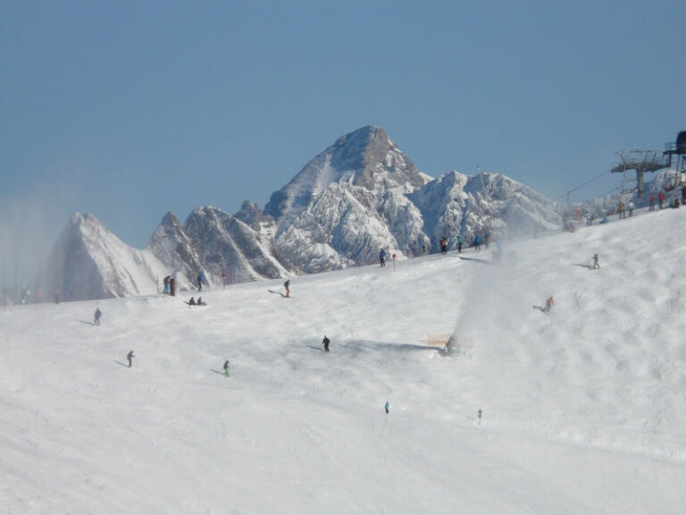 Image of people skiing on steeper mountain slope