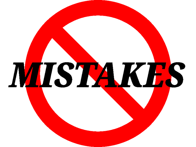 Image of the word 'mistakes' with the universal no symbol on it, representative of avoiding mistakes while buying mountain bike gear