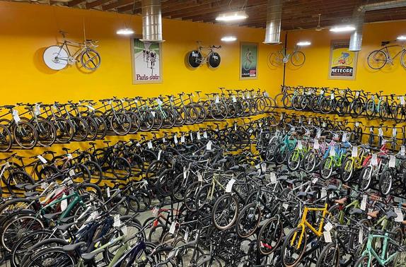 Image of the inside of the shop showing the vast selection of bicycles